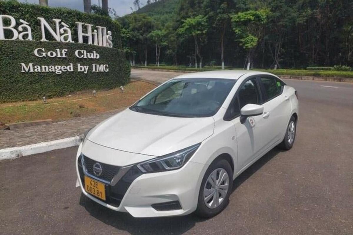 a white car parked in a parking lot