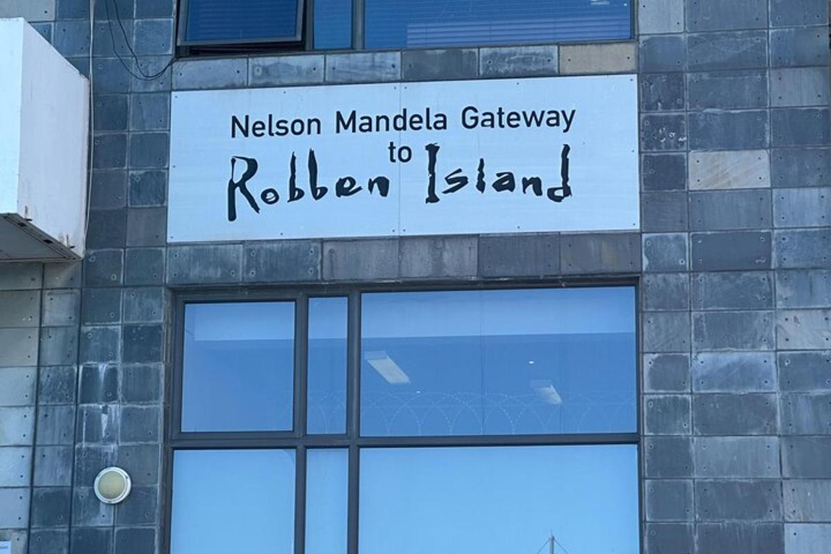 a sign on a building that says nelson mandela gateway to ribbon island