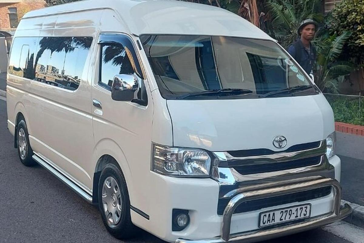 a white van is parked on a street