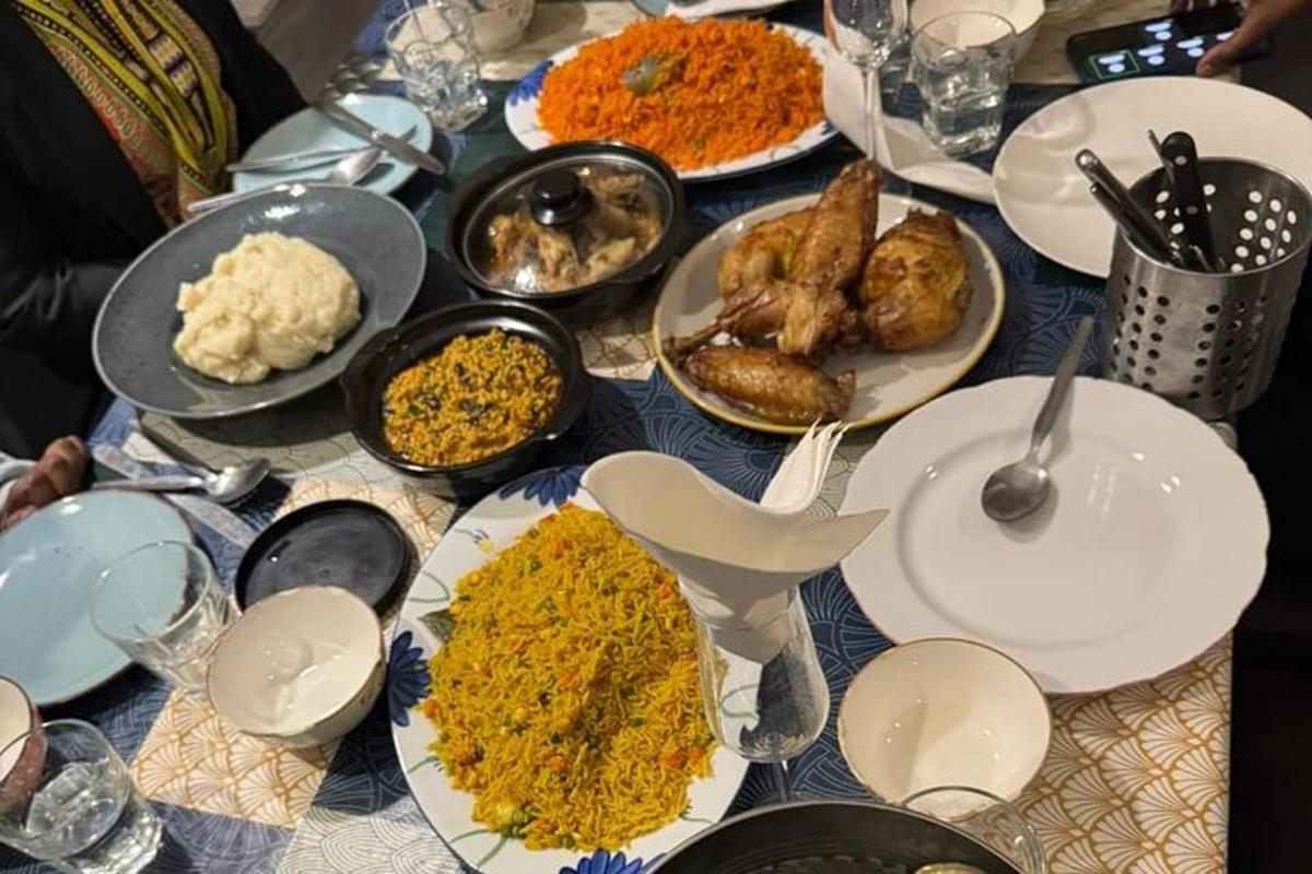a table with many plates of food on it