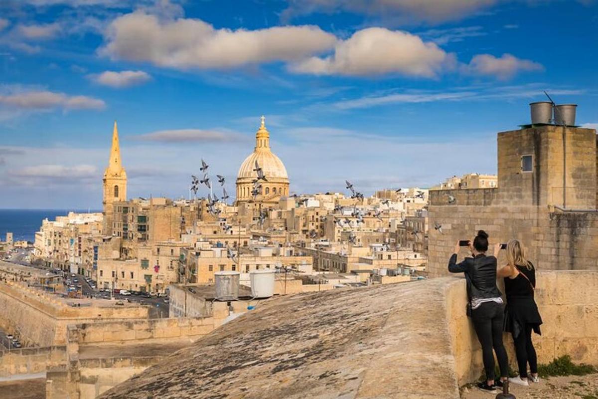 a couple taking a picture of a city