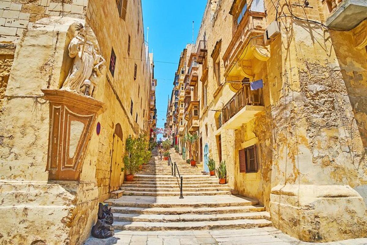an alley in an old town with stone buildings