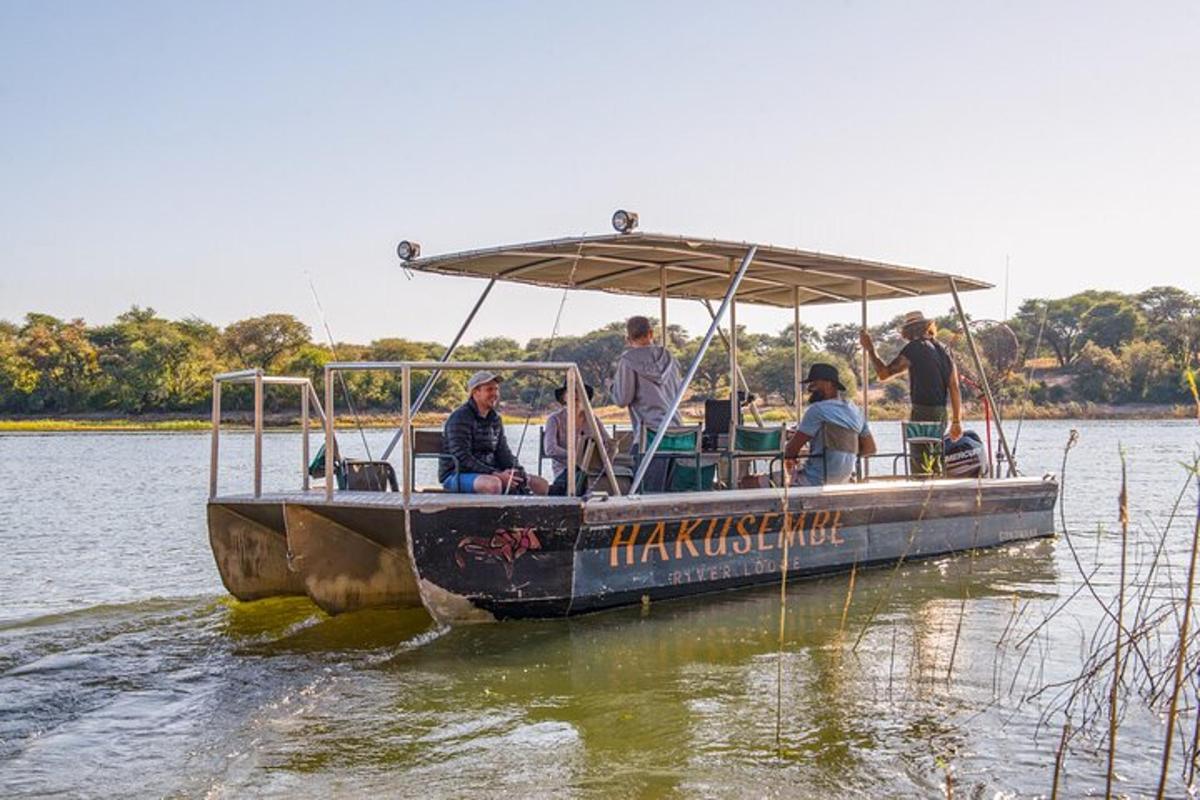 a group of people on a boat in the water