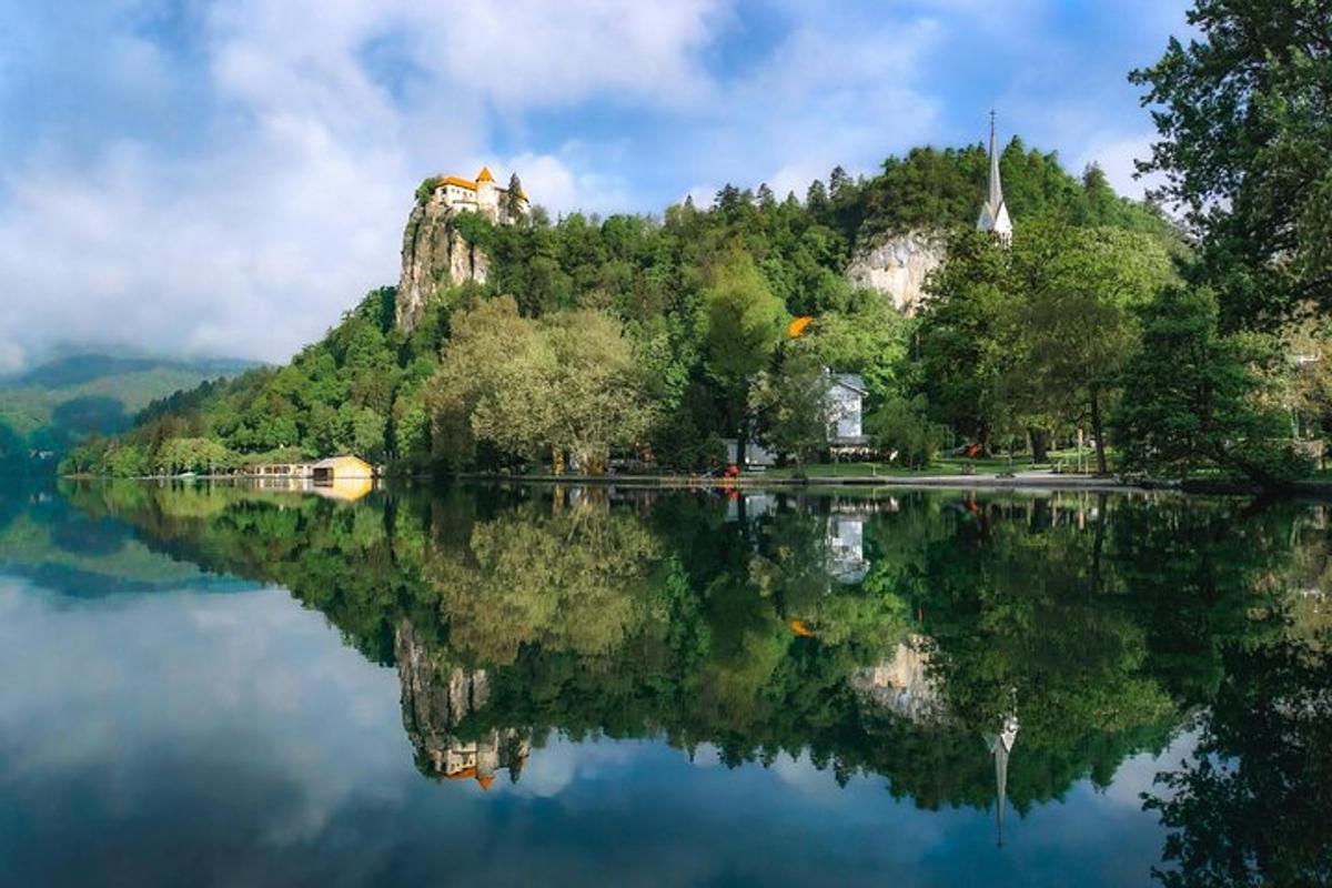 a reflection of a mountain in the water