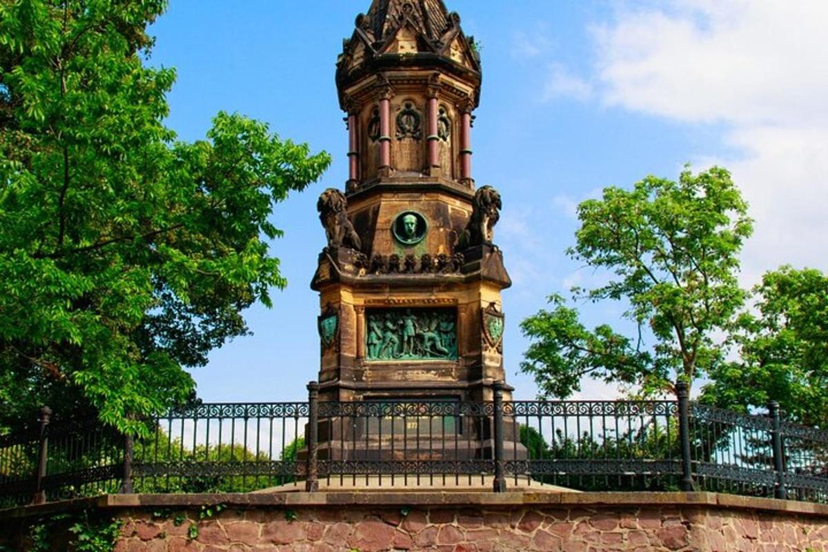 a clock tower on top of a fence