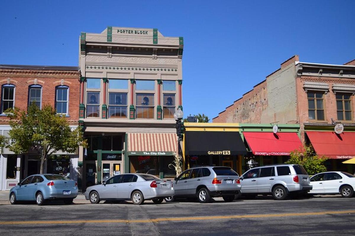 a group of cars parked in front of a building