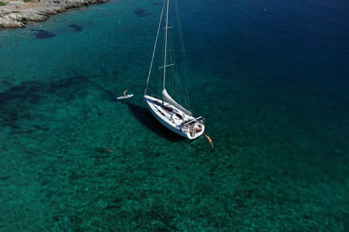 a boat floating in the water in the ocean