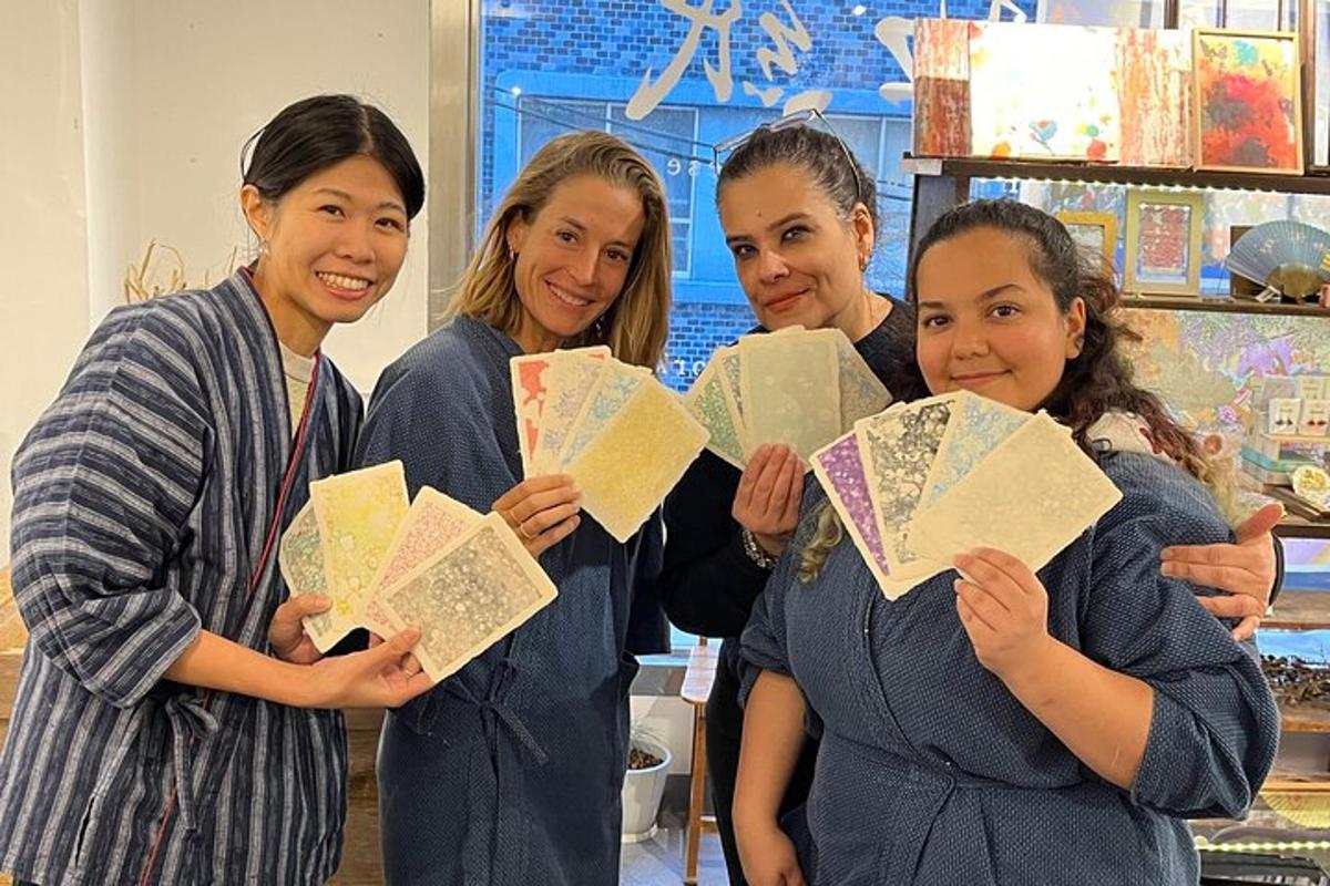 a group of women posing for a picture while holding books