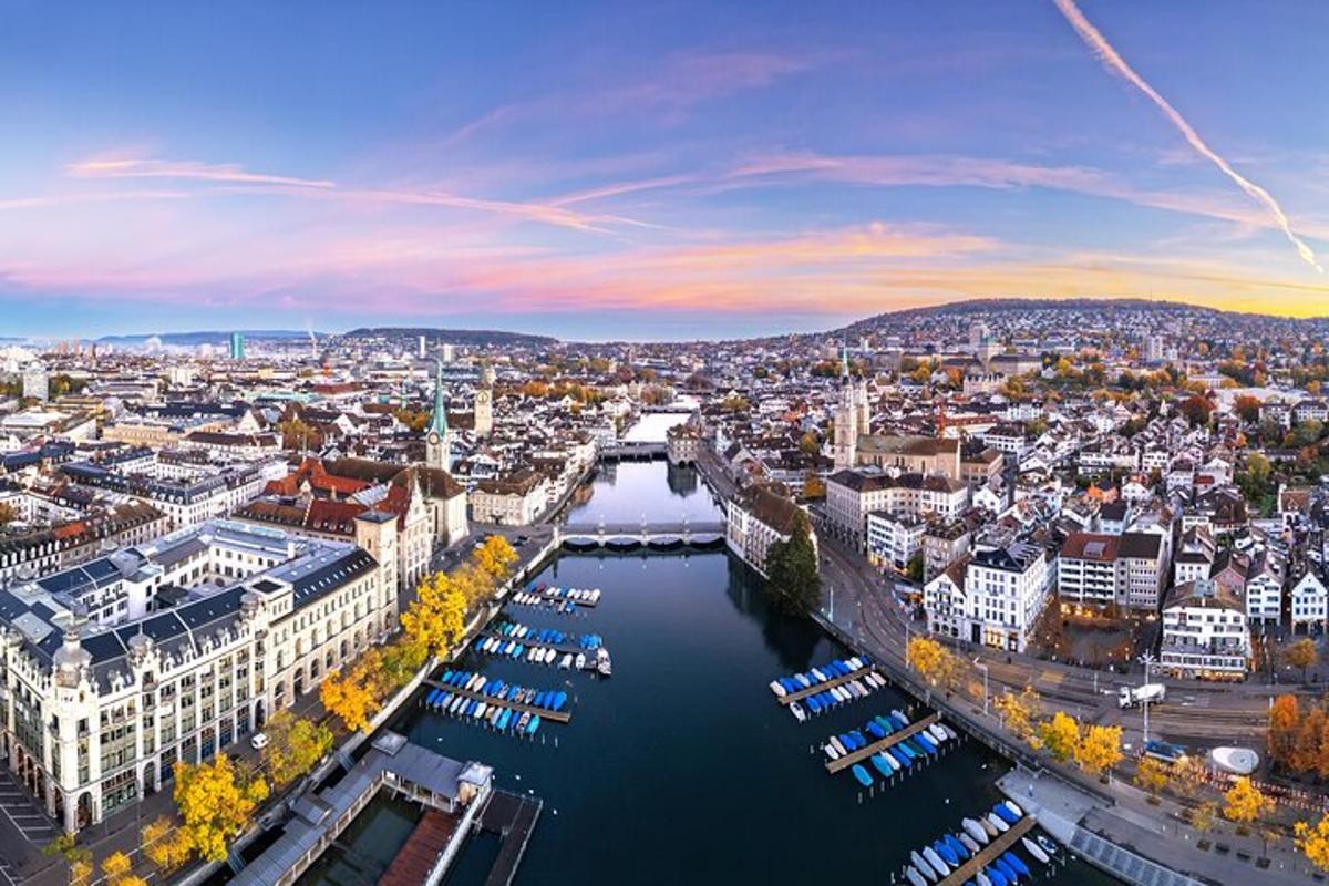 an aerial view of a city with a river