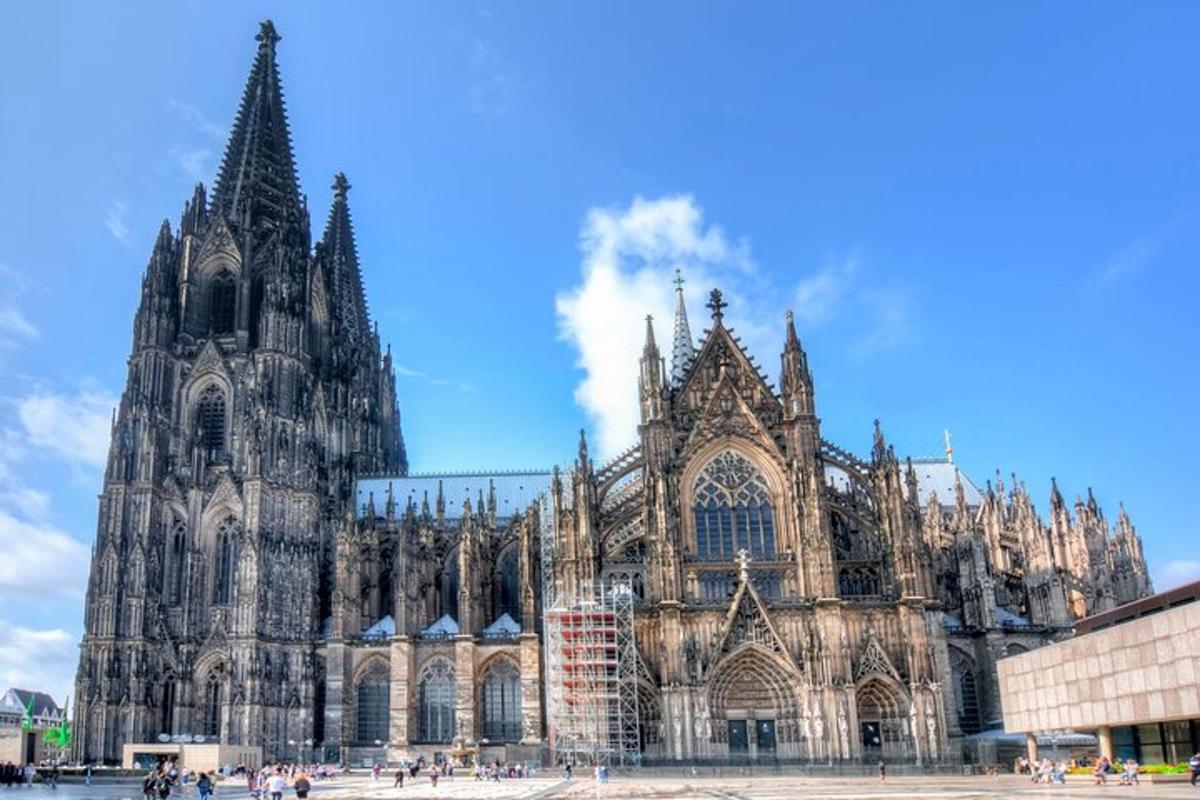 a large cathedral with a blue sky behind it