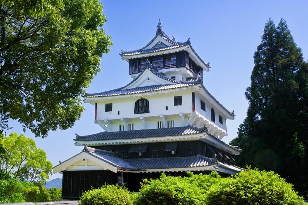 a large white building with a tower