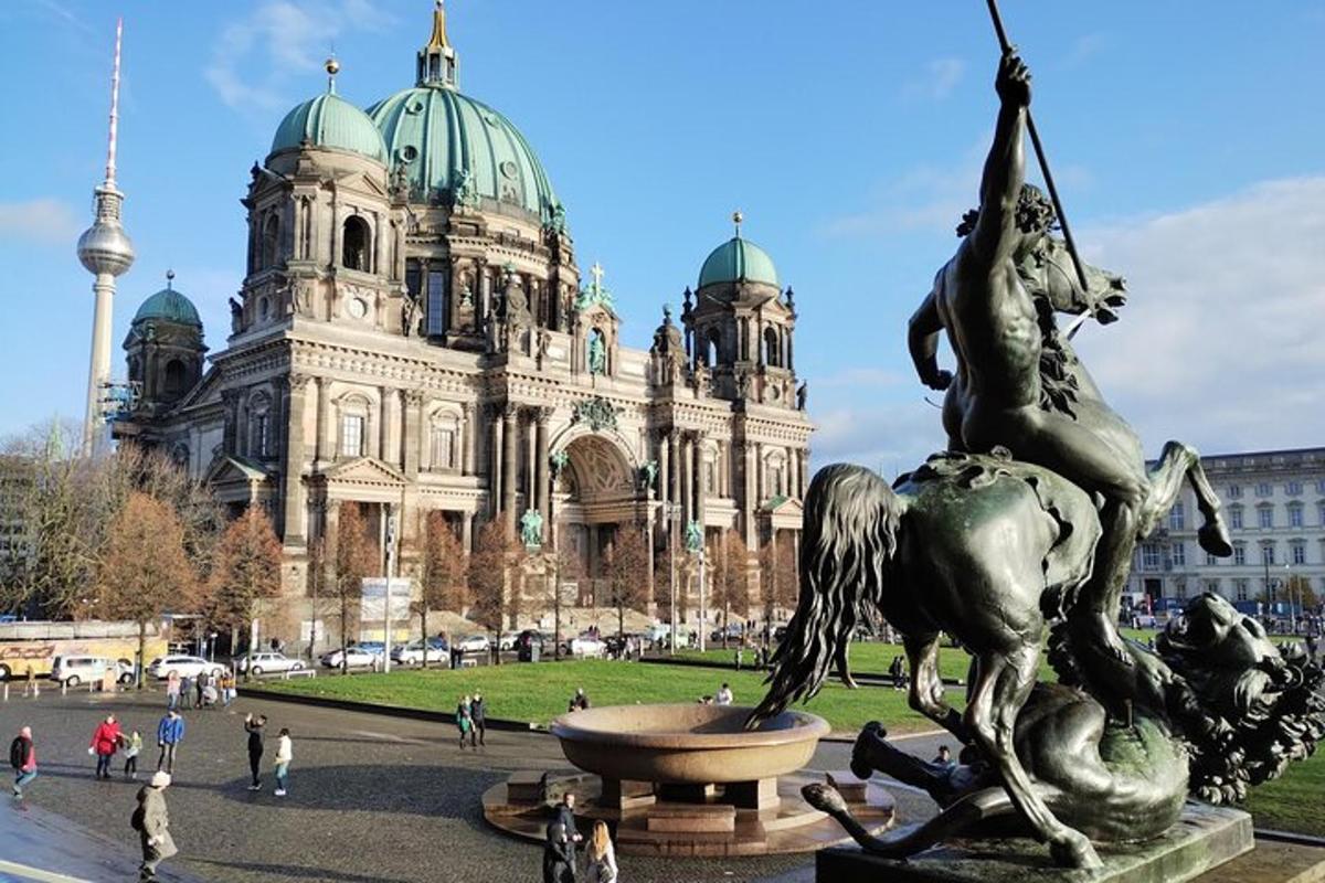 a statue of a woman on a horse in front of a building