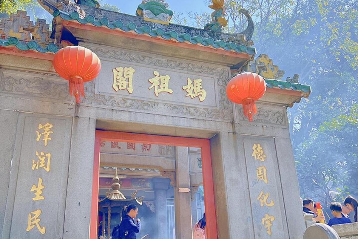 a building with orange lanterns on top of it
