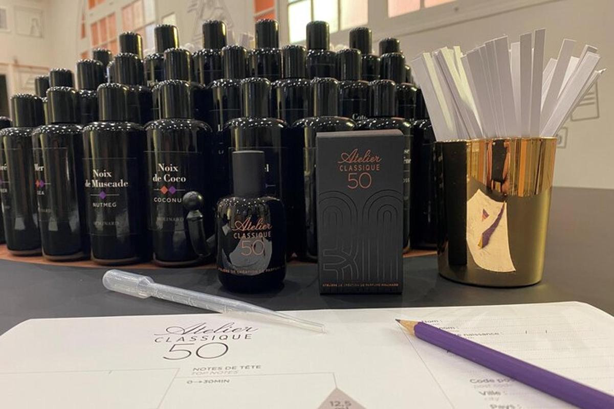 a group of black bottles sitting on top of a table
