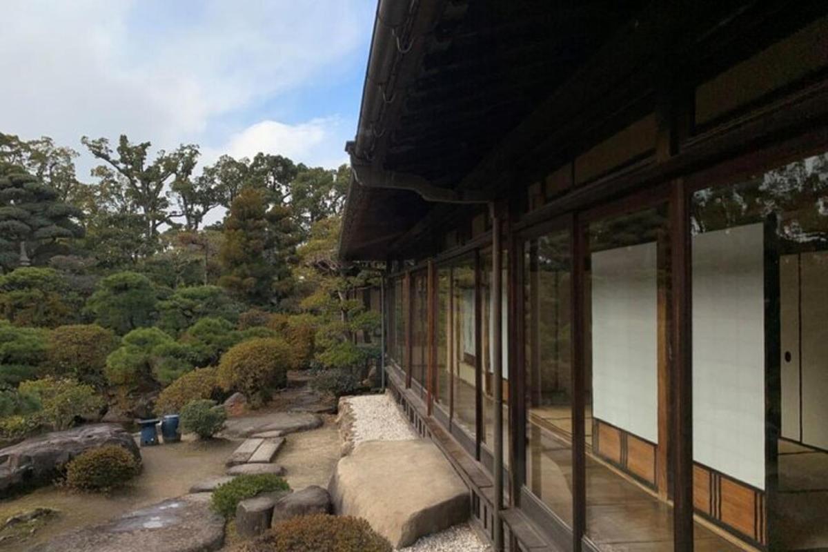 a building with windows and a view of a garden