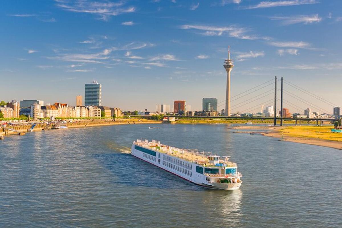 a boat traveling down a river in a city