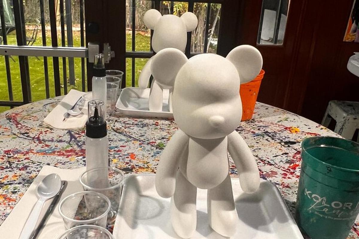 a white figure sitting on top of a table