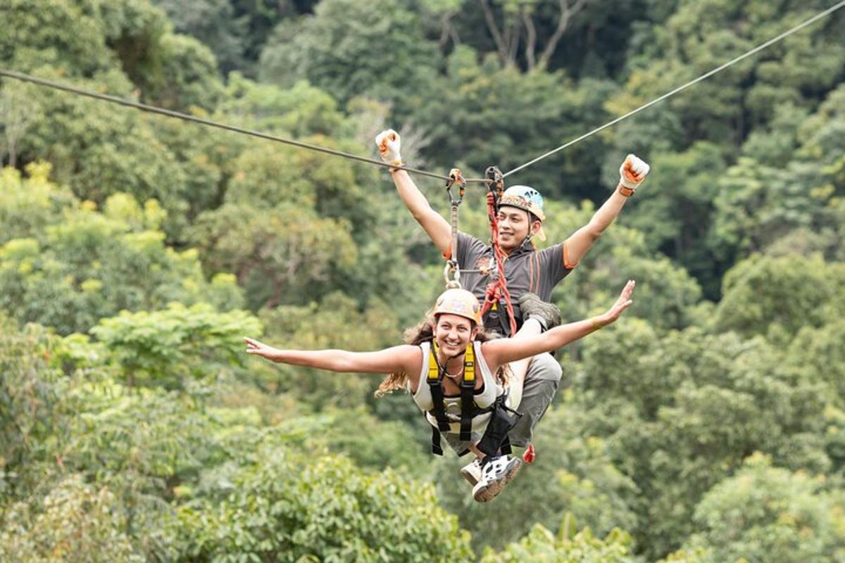 a man and a woman on a zip line