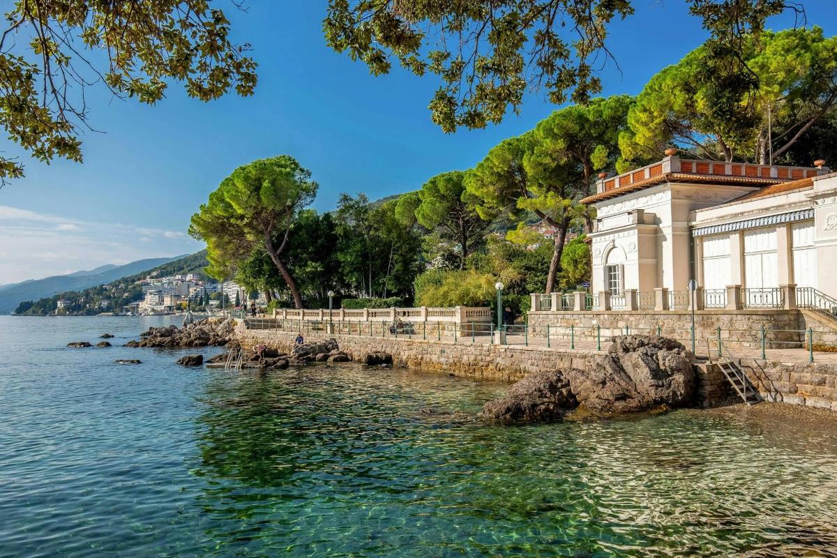 a building on the shore of a body of water