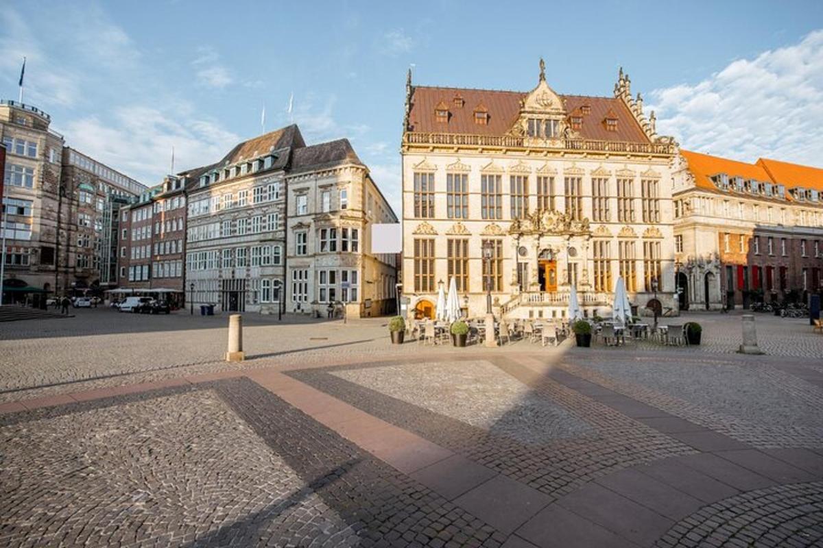 a group of buildings in a square in a city