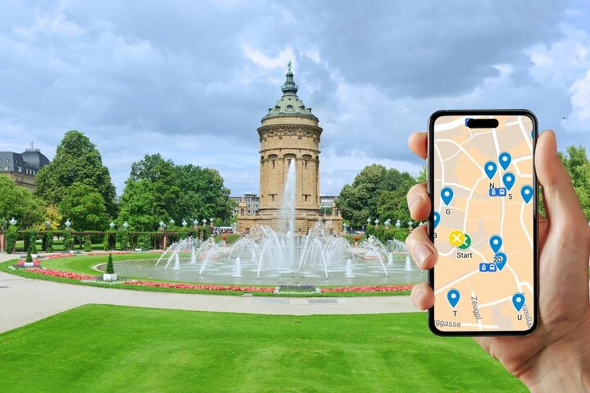 eine Person, die ein Foto von einem Brunnen vor einem Gebäude macht