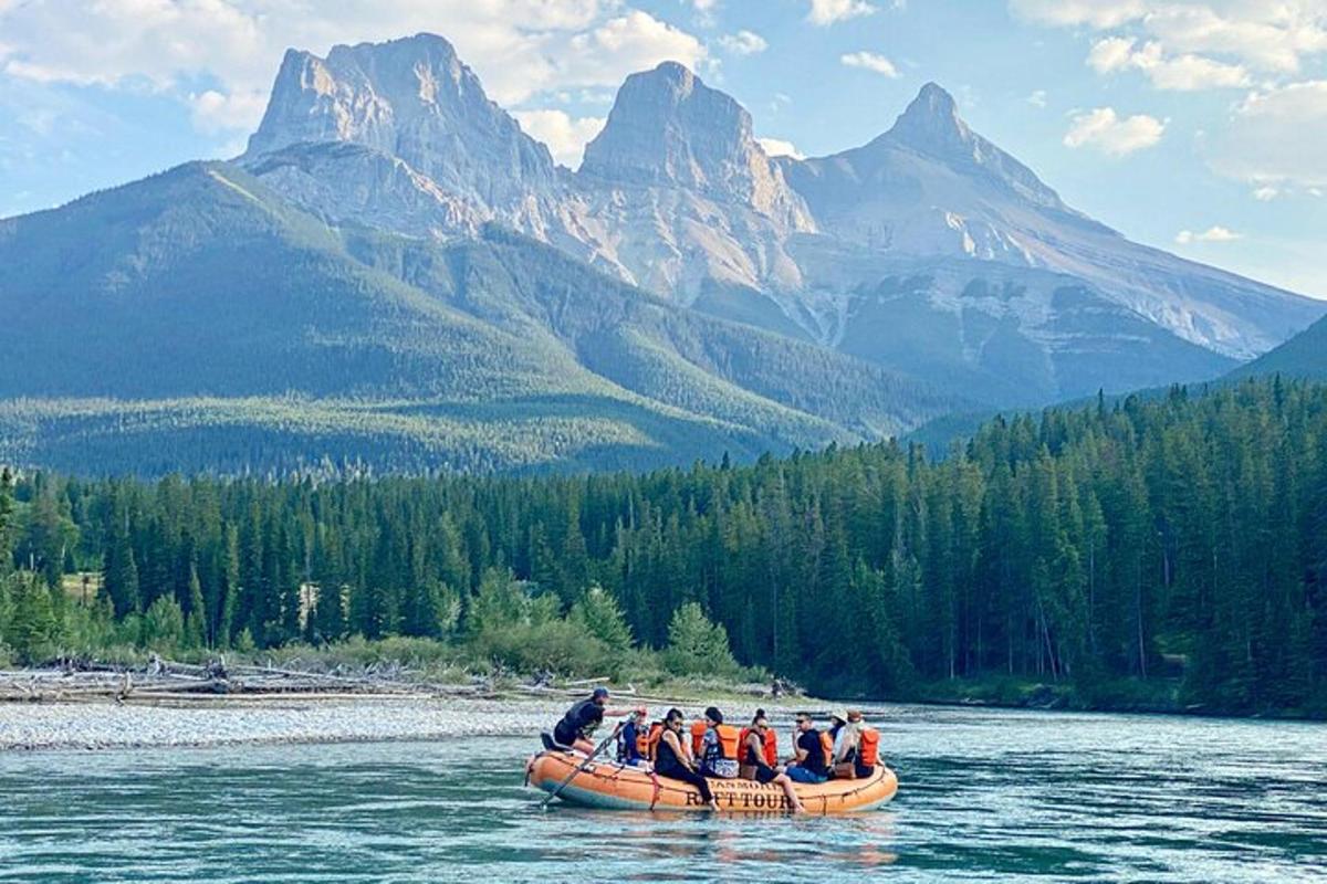 a group of people in a raft on a river