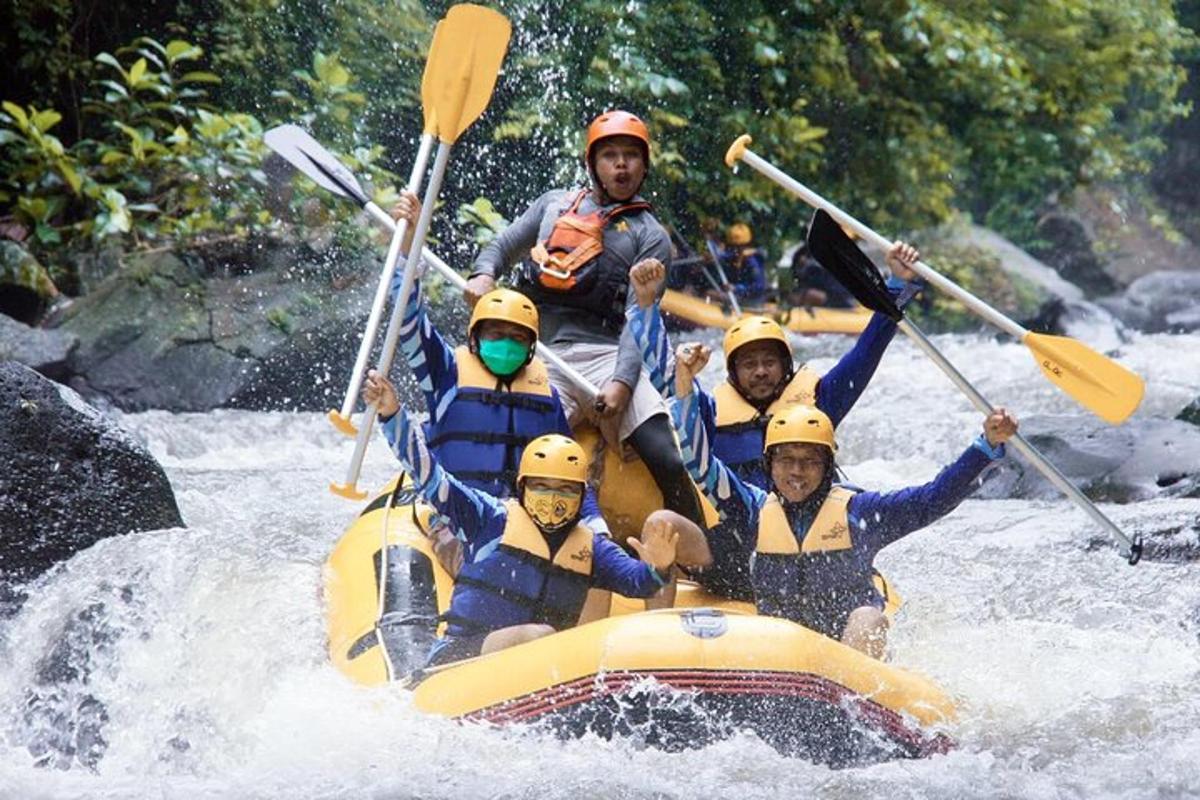 a group of people in a raft on a river