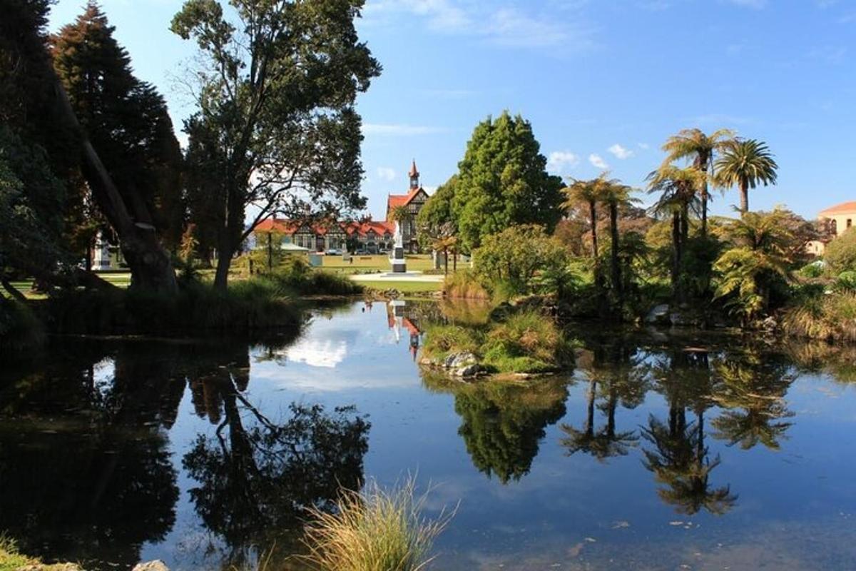 a view of a river with palm trees and buildings