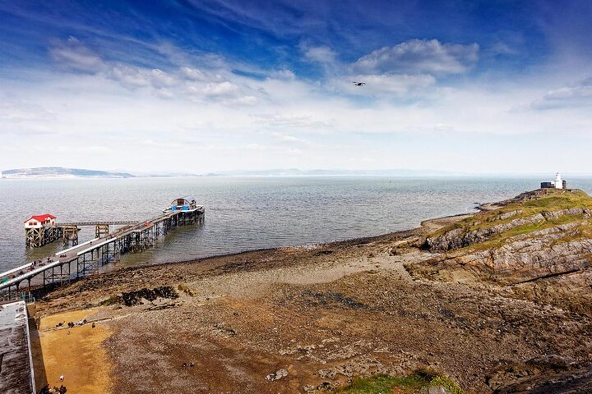 a boat is docked at a pier in the water