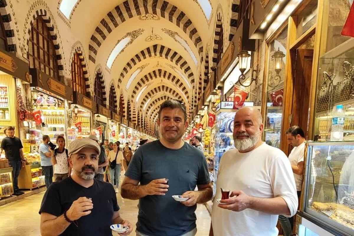 a group of three men standing in a shopping mall