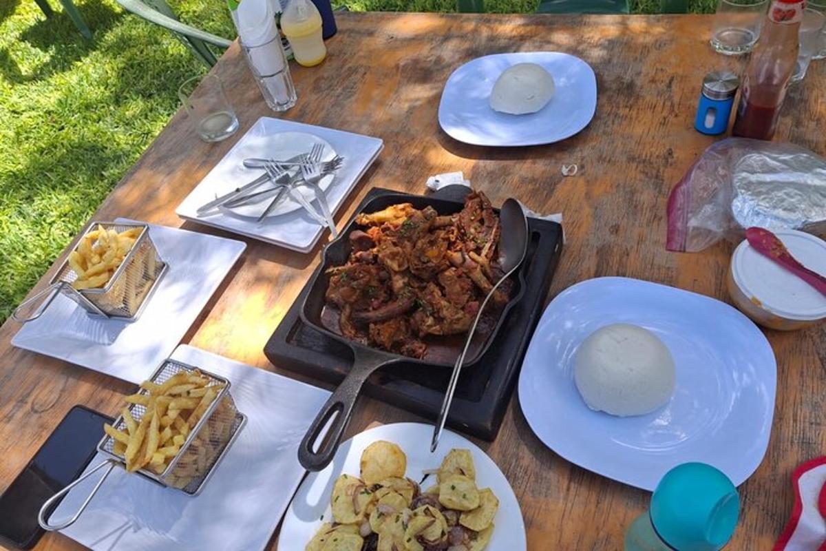 a table with food and plates of food on it