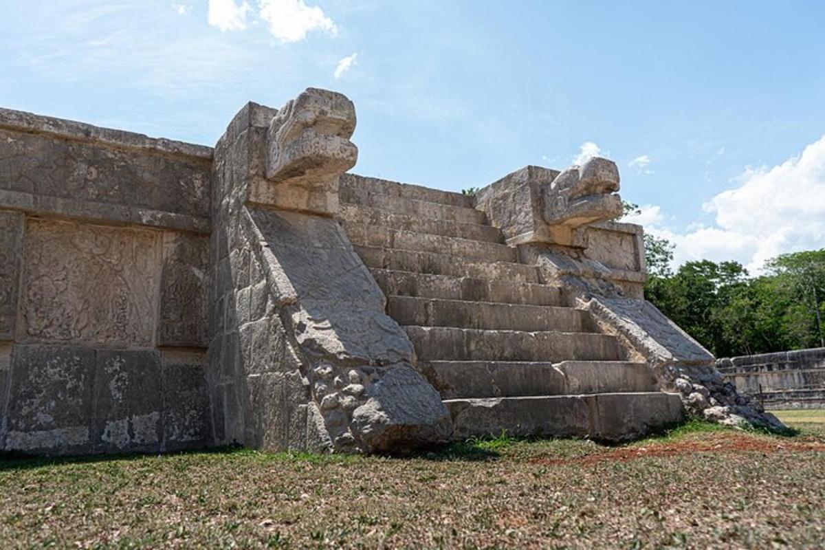 an old stone wall with a bunch of steps