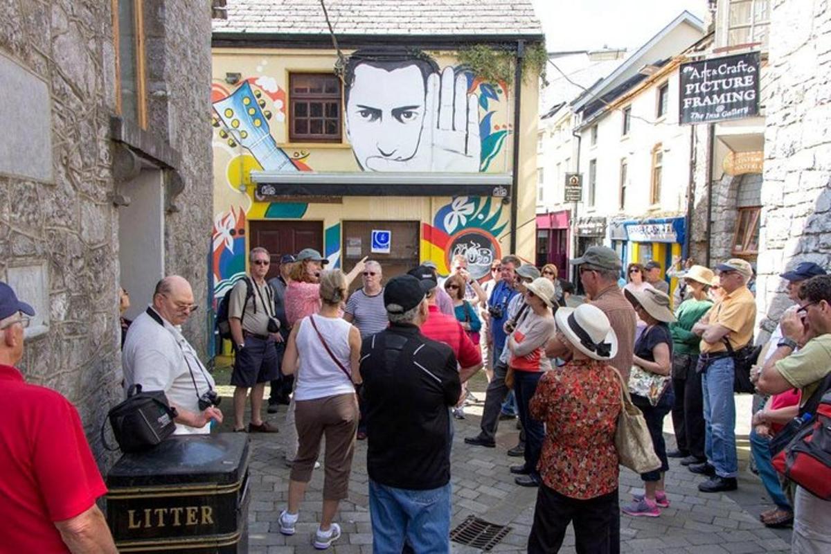 a crowd of people standing on a street