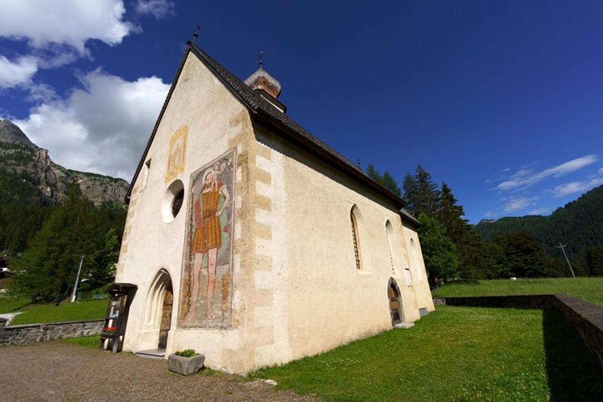 a church with a painting on the side of it