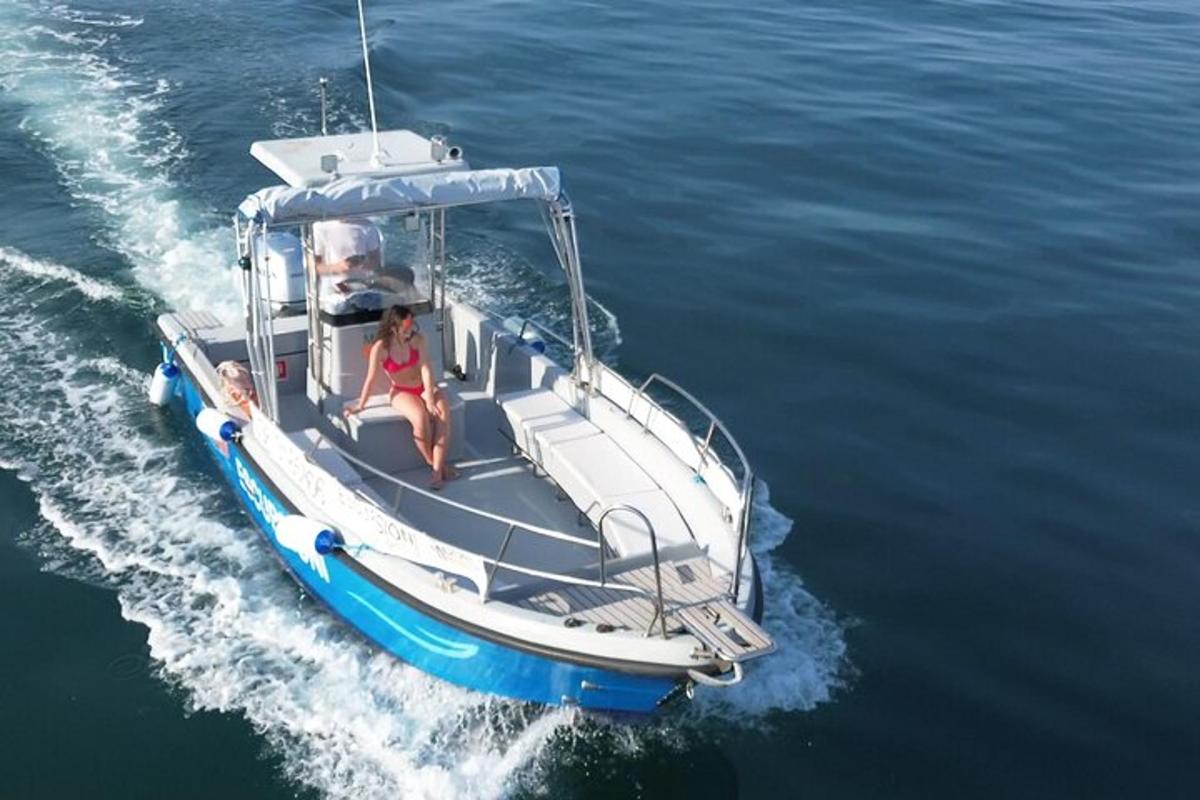 a woman on a boat in the water