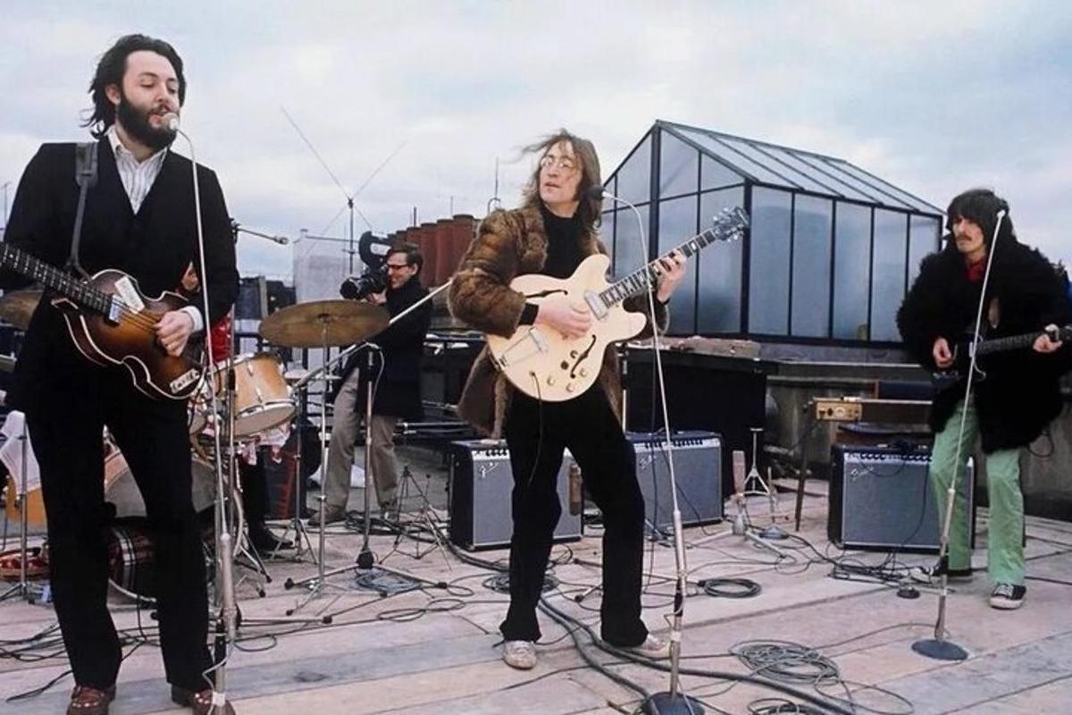 a group of people playing music on a stage
