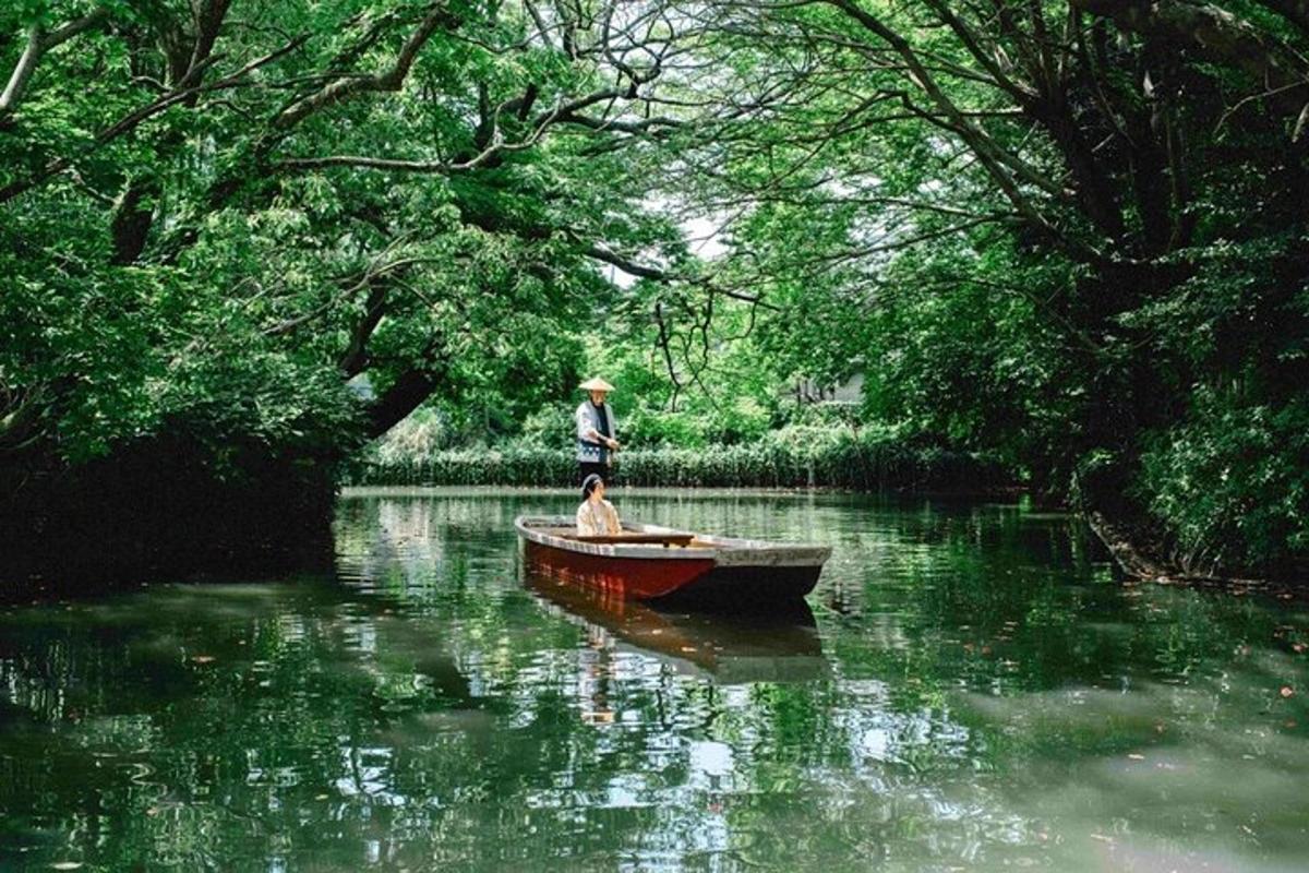 a man and a dog in a boat on a river