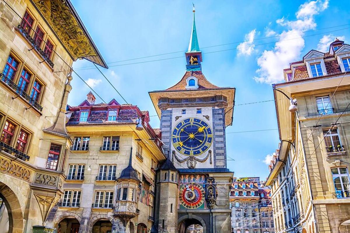 a large clock tower in the middle of buildings