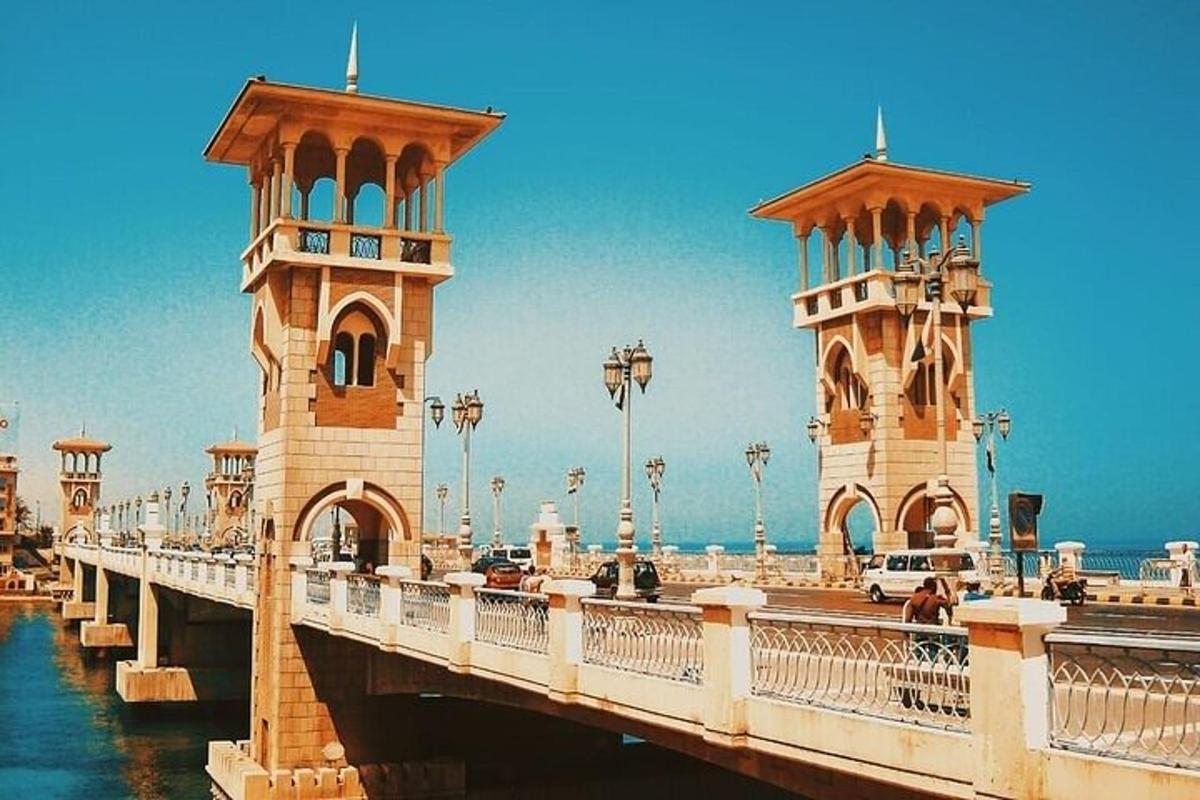 a bridge over the water with two towers