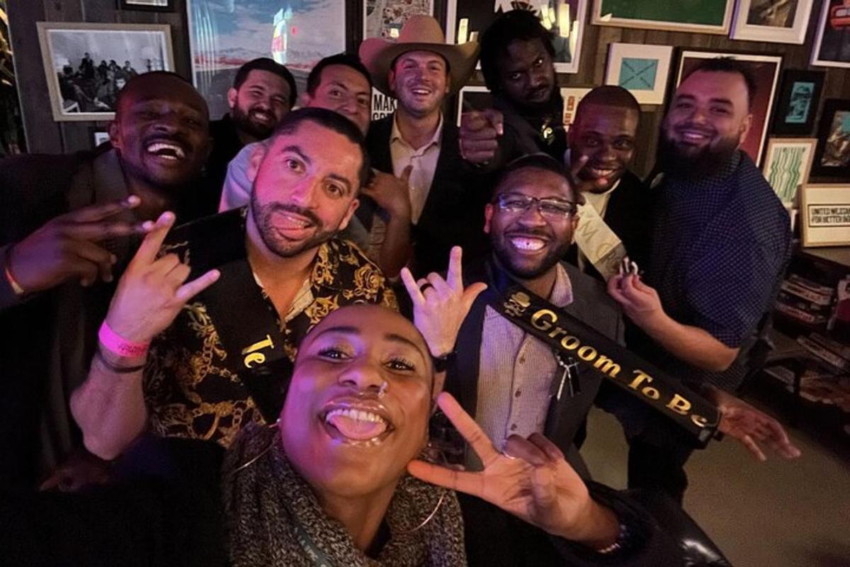 a group of men posing for a picture