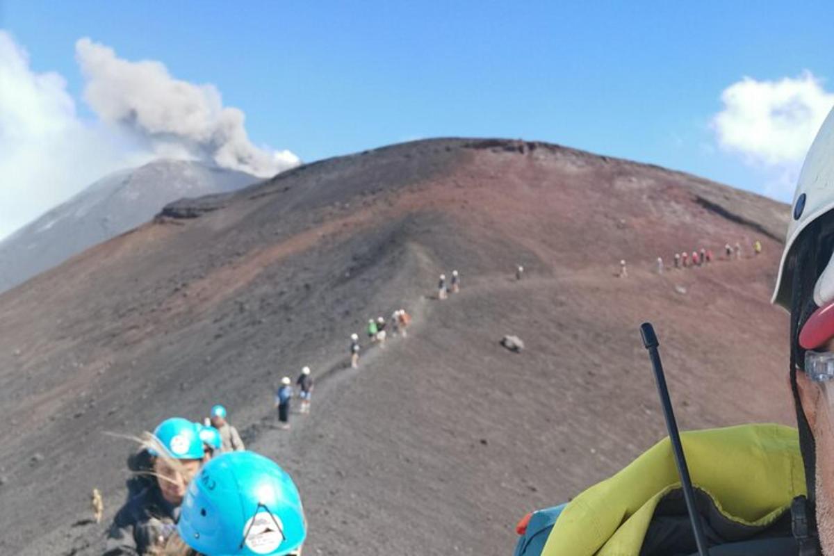 a group of people on top of a mountain