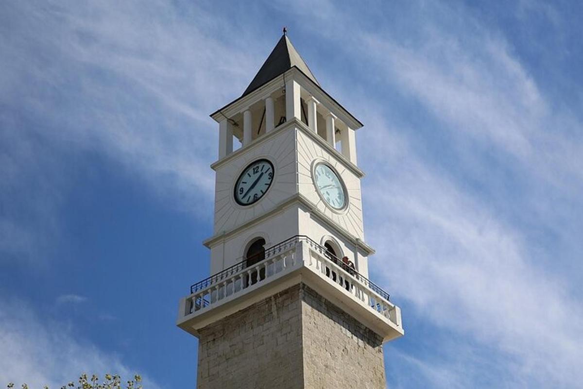 a tower with a clock on top of it