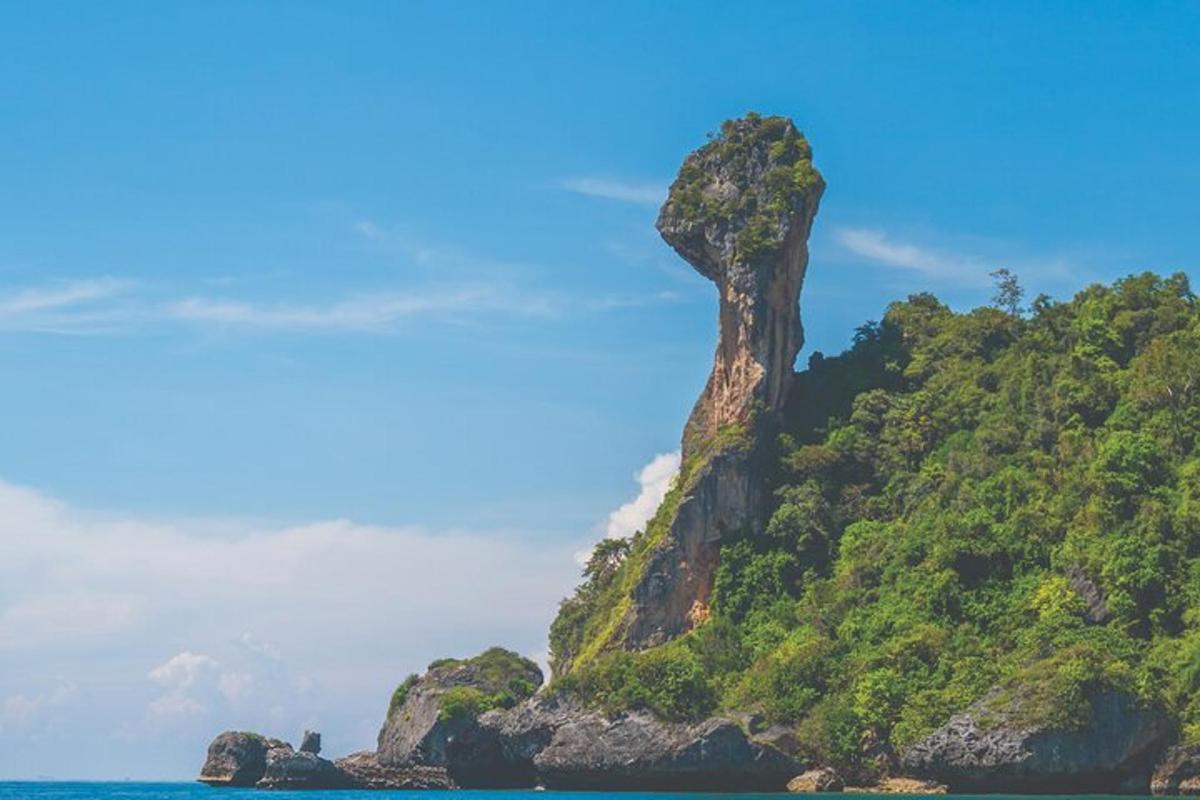 a rock formation on a mountain in the ocean
