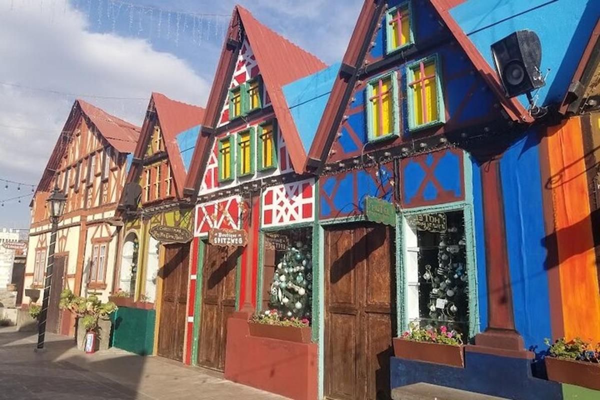 a building with colorful paint on it on a street