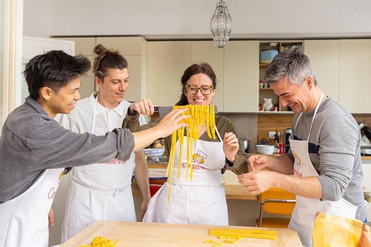 a group of people in a kitchen preparing food