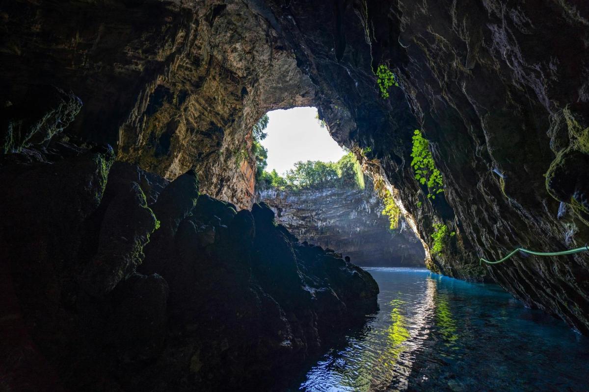 a cave with a river in the middle