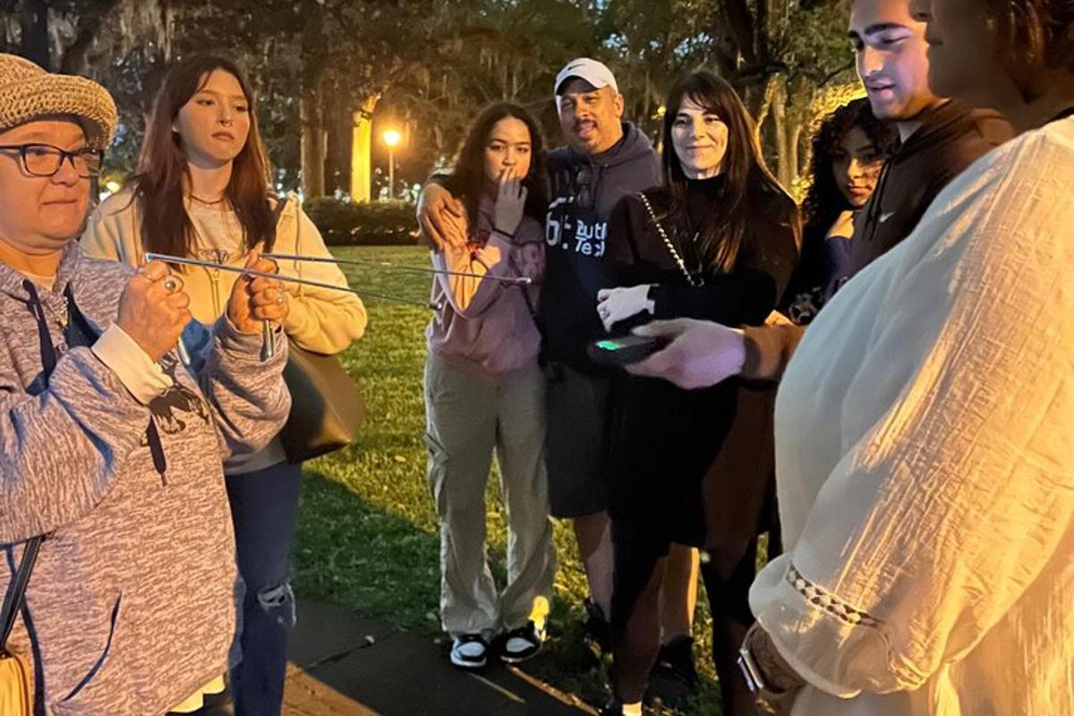 a group of people standing in a park