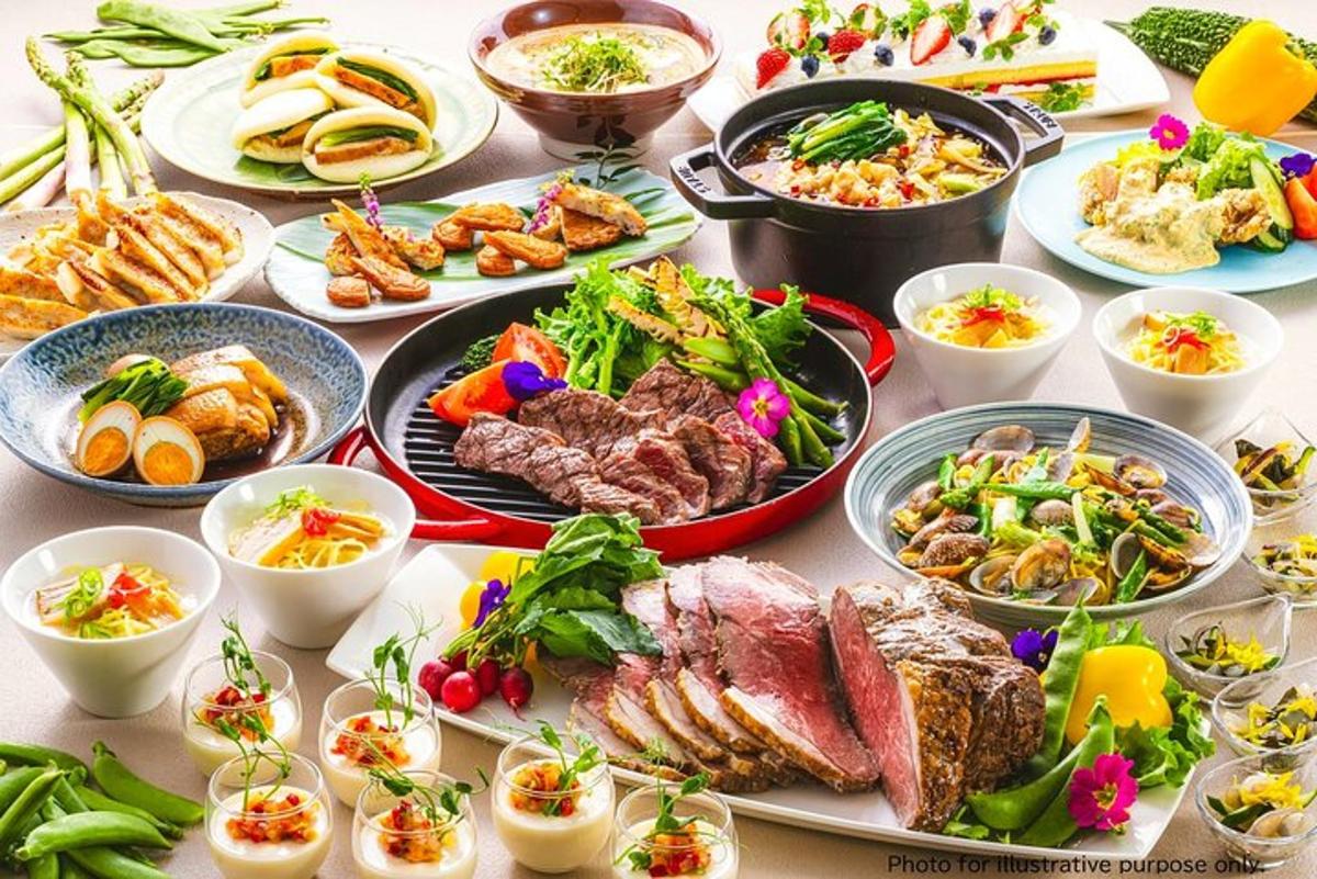a table with many plates of food on it