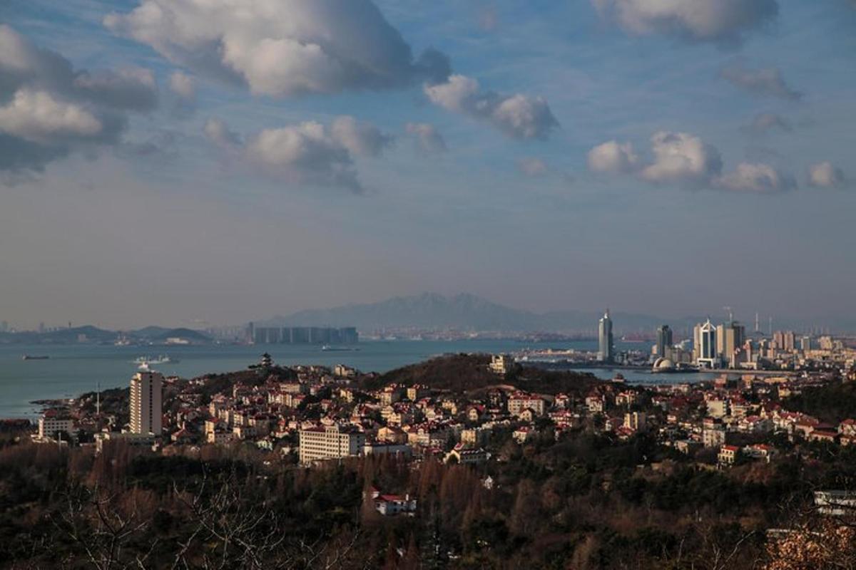 a cityscape of a city with buildings and water