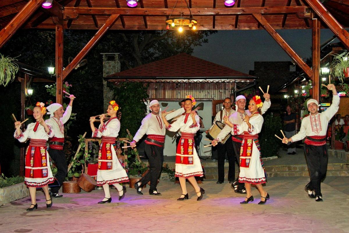 a group of people dancing on a stage